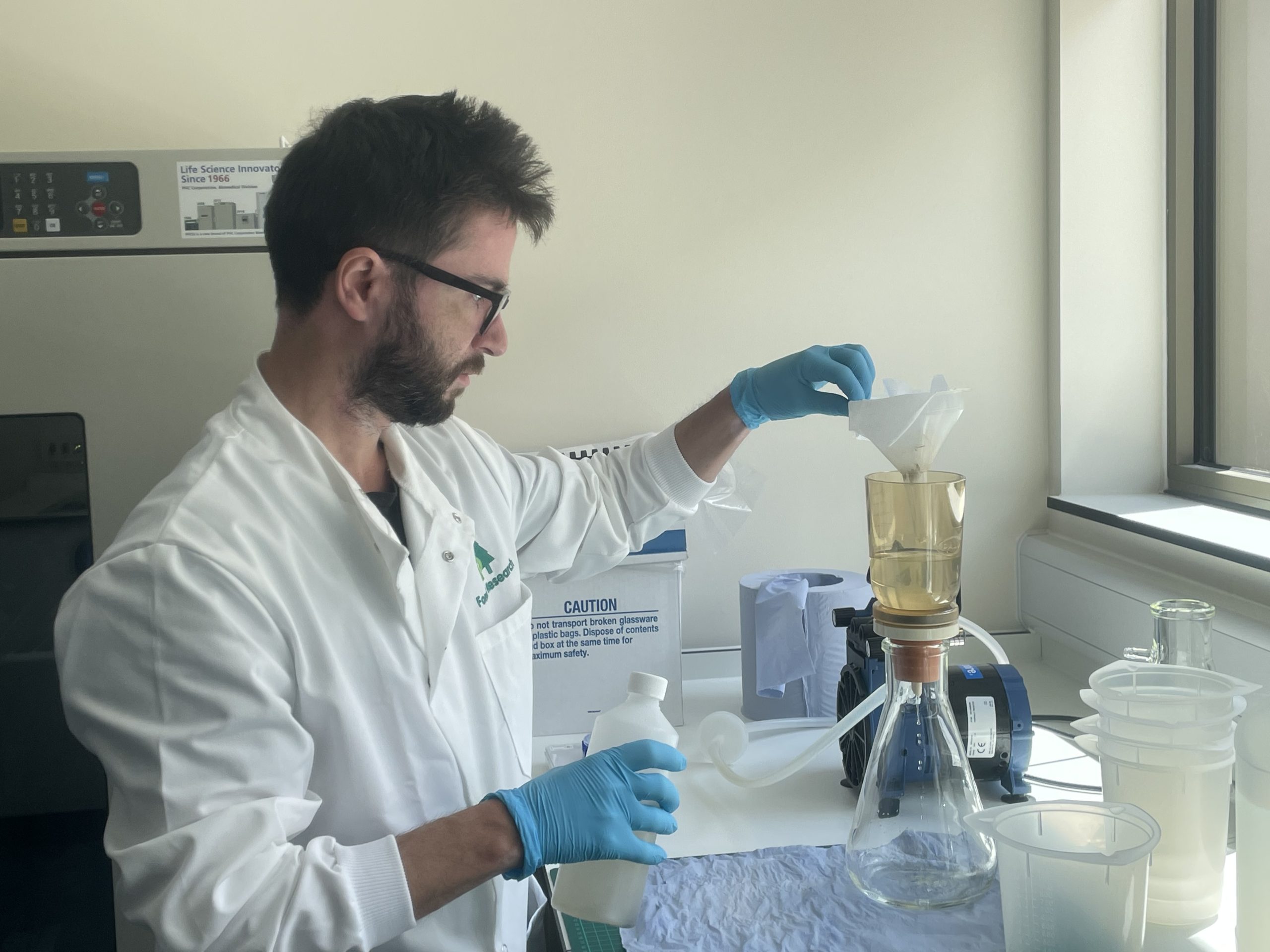 Leone working in the tree health lab