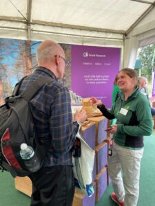Caroline Gorton from the FR Tree Health Diagnostic and Advisory Service talks to a visitor at APF 2022.