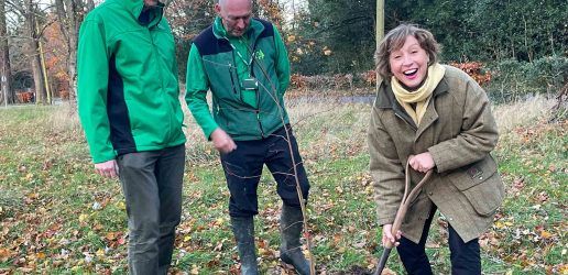The minister digging with Forest Research staff