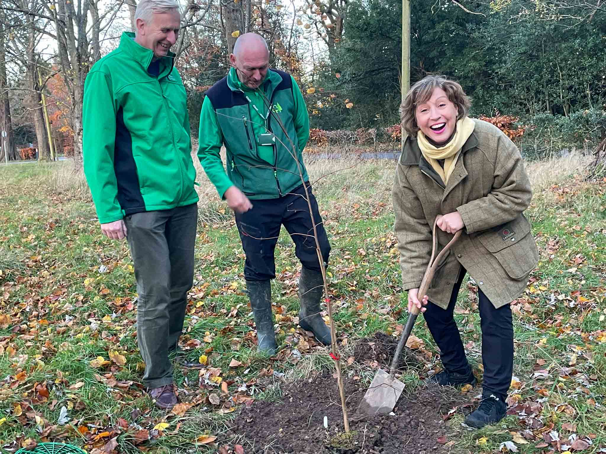 The minister digging with Forest Research staff