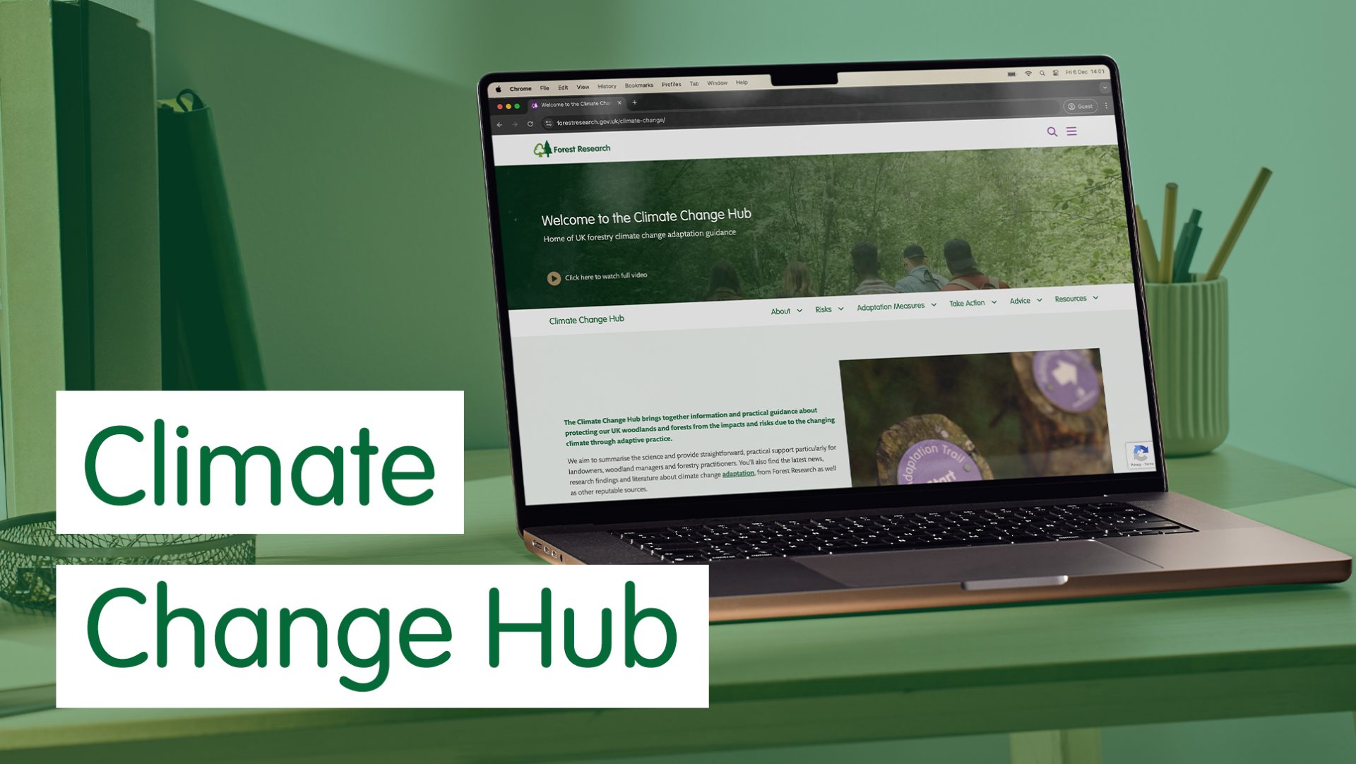 A graphic showing a laptop with the Climate Change Hub visible. The text reads "Climate Change Hub"