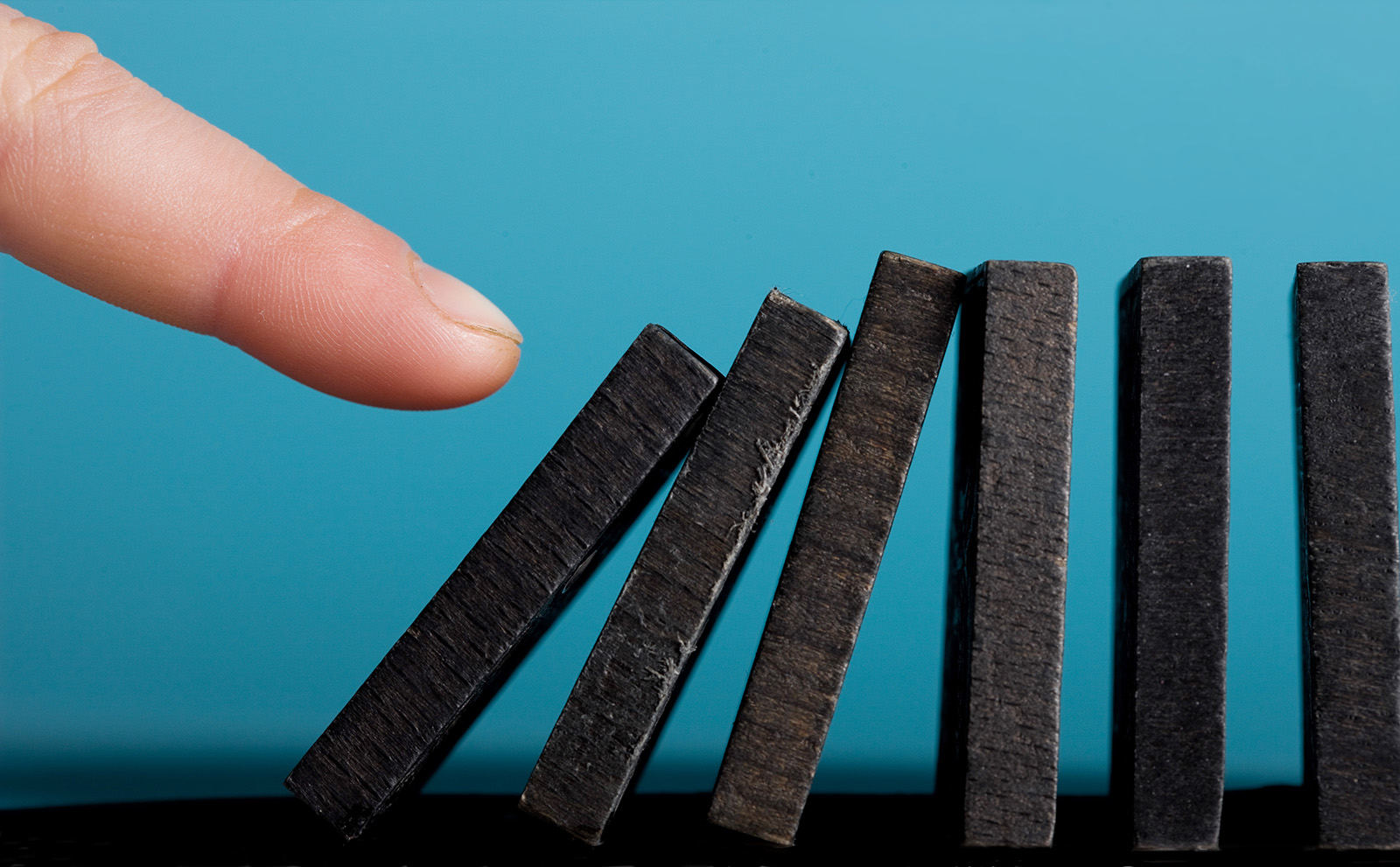Finger setting off domino effect
