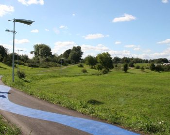 Parkland, people walking on path