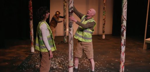 Man and woman acting in play in forest