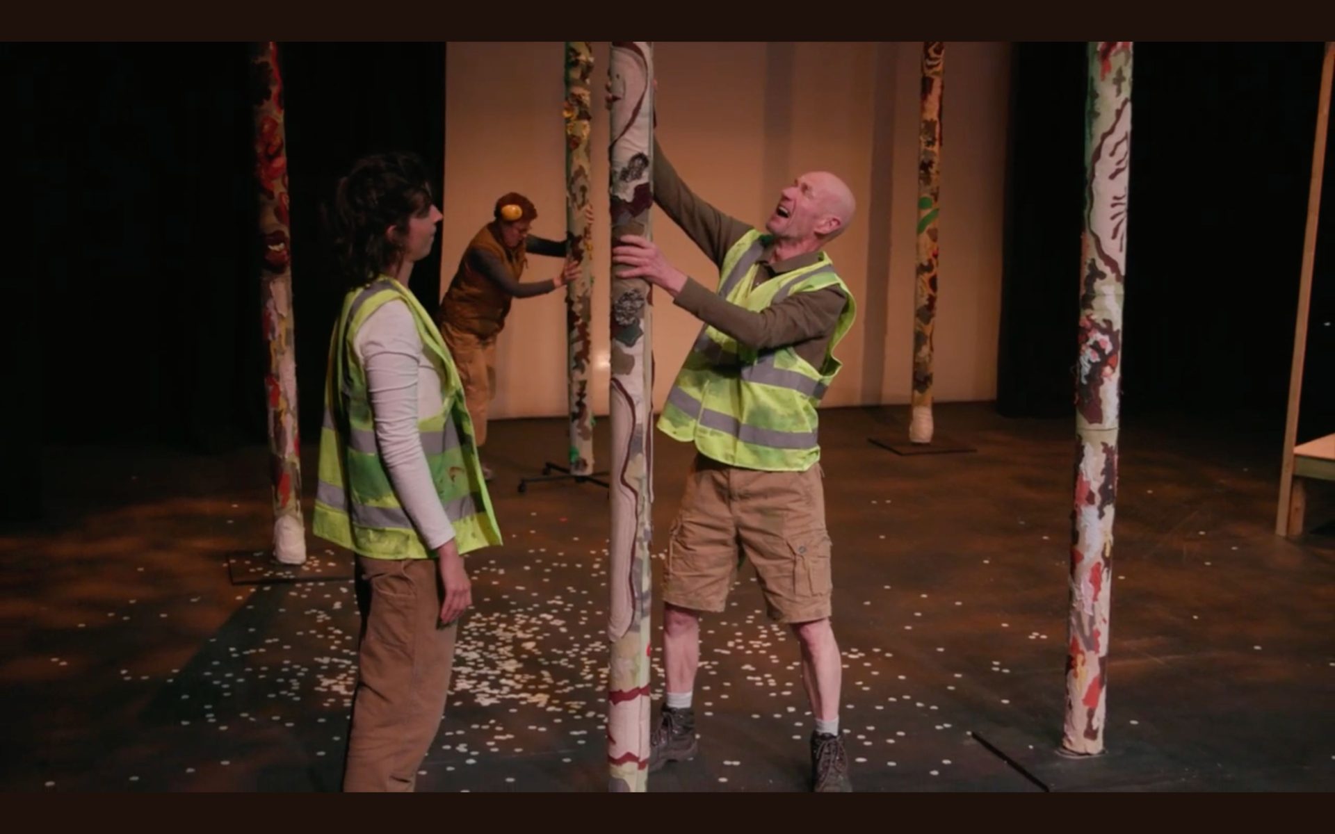 Man and woman acting in play in forest